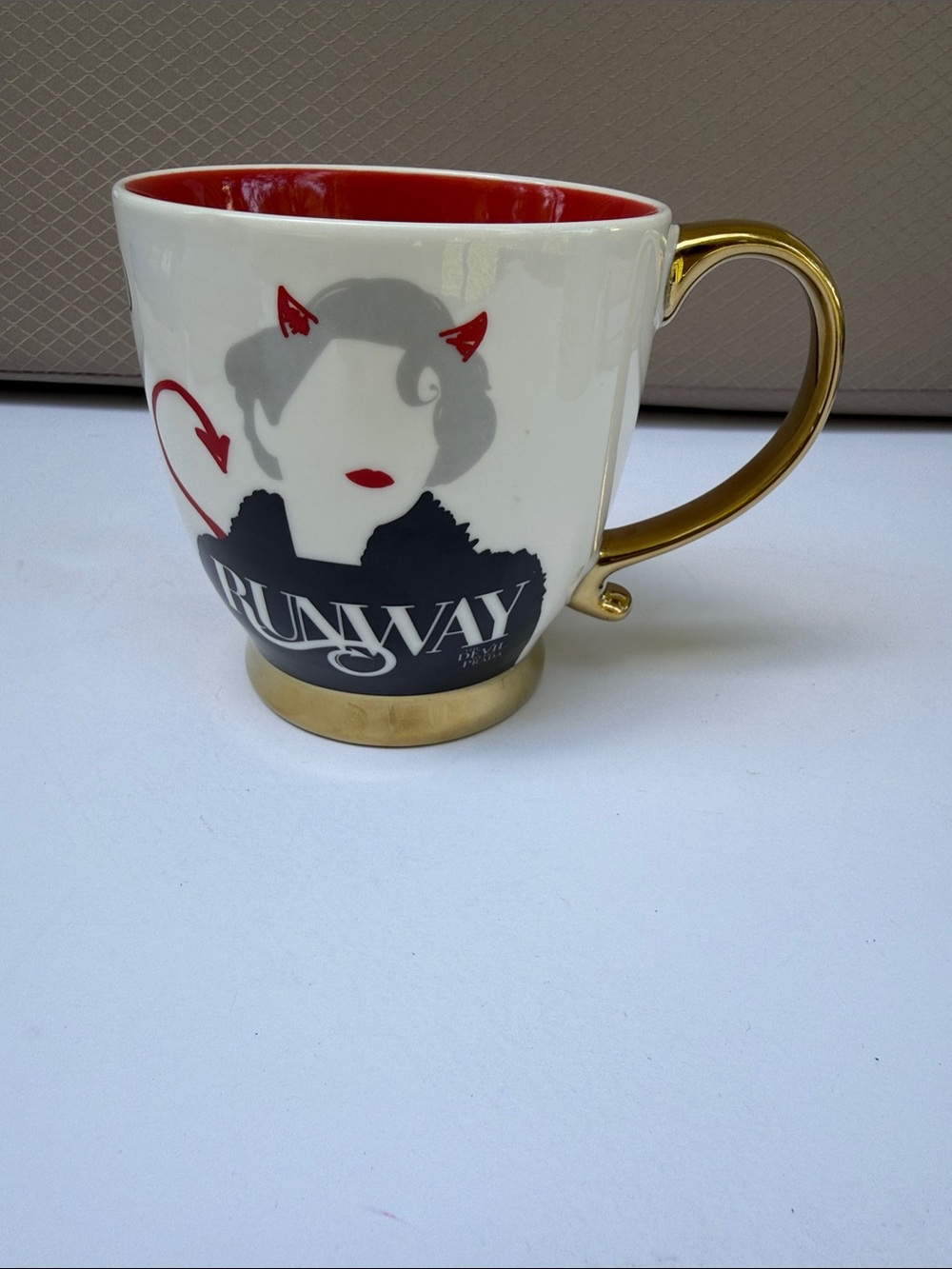 Runway Ceramic Mug with Gold Handle and Red Interior
